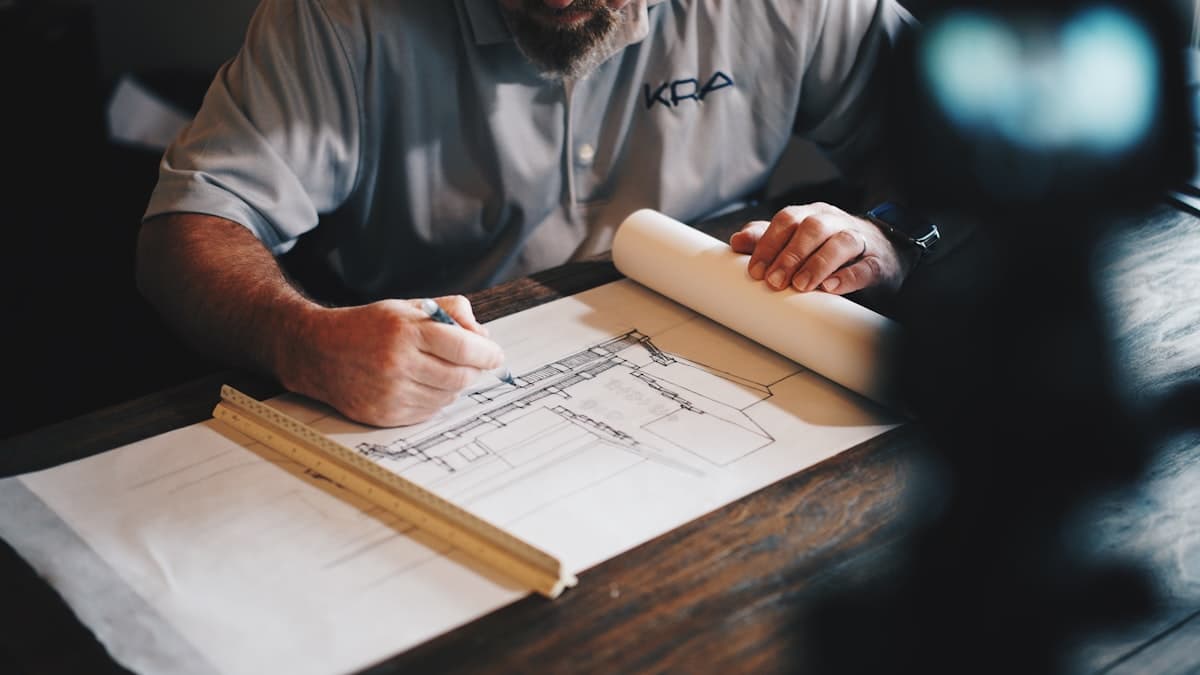 Construction team reviewing architectural plans